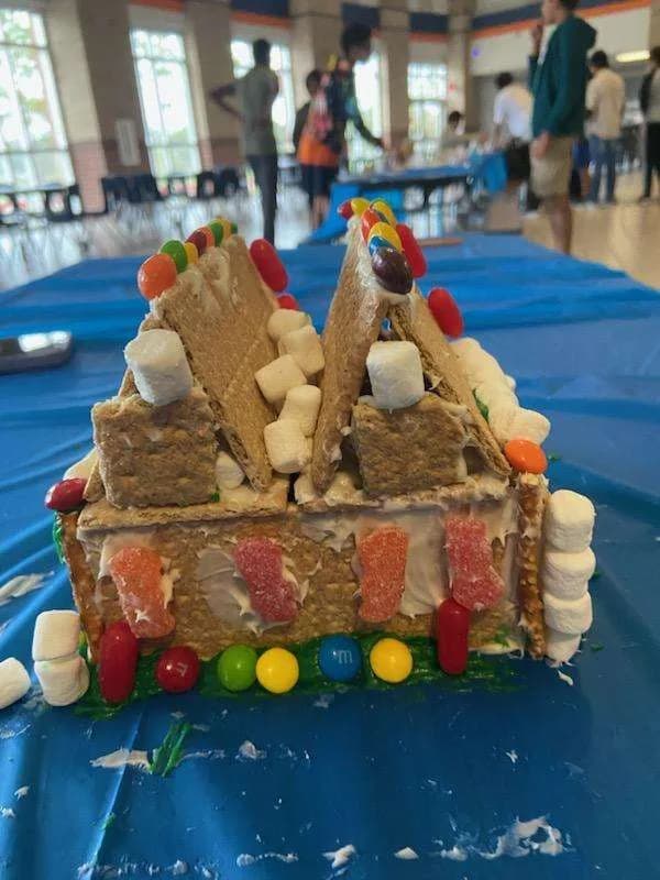 Graham-cracker house decorated with candy and marshmallows
