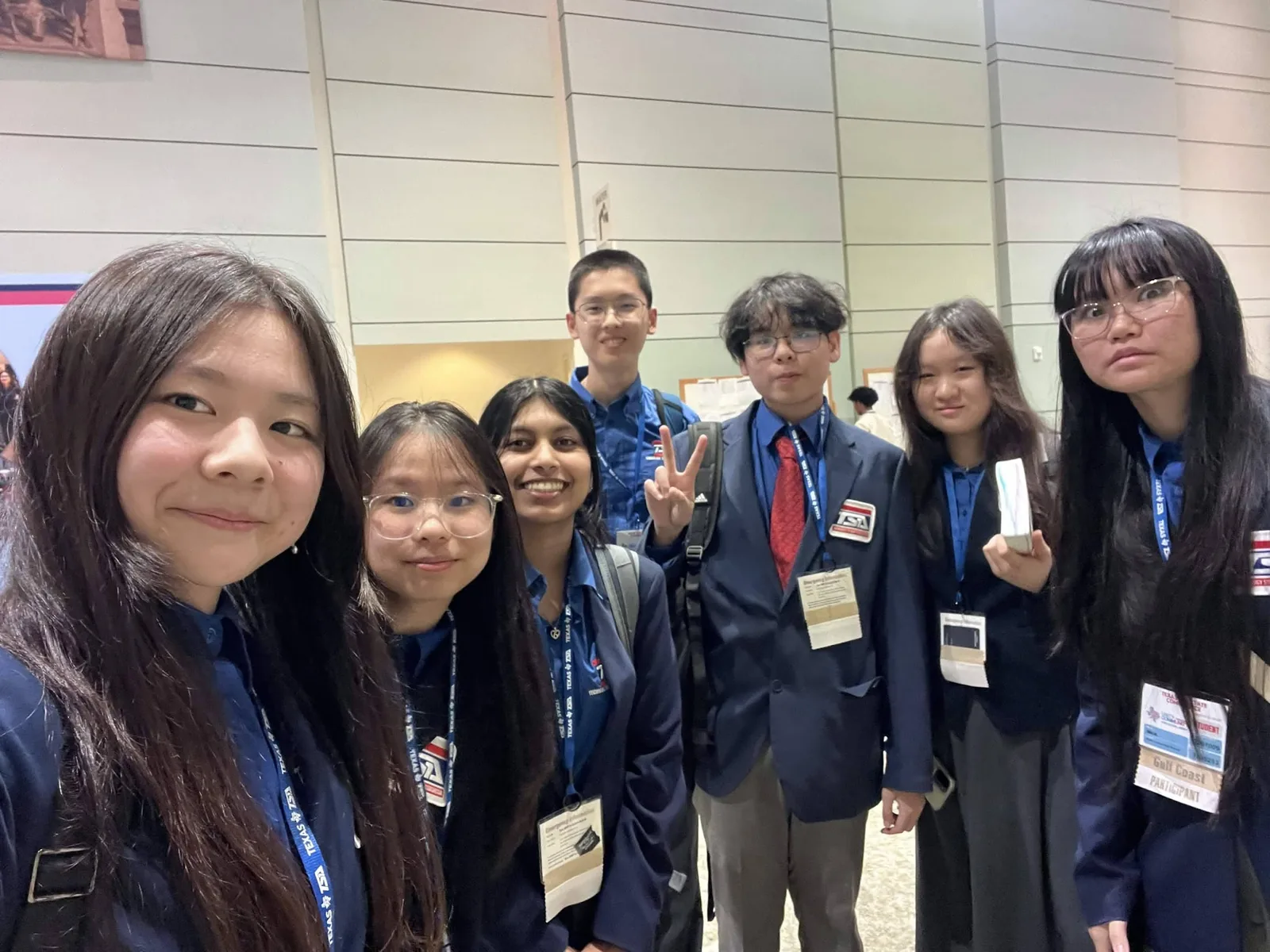 SLHS TSA members in official conference dress gathered for a group photo inside the Fort Worth Convention Center at the 2026 Texas TSA State Conference
