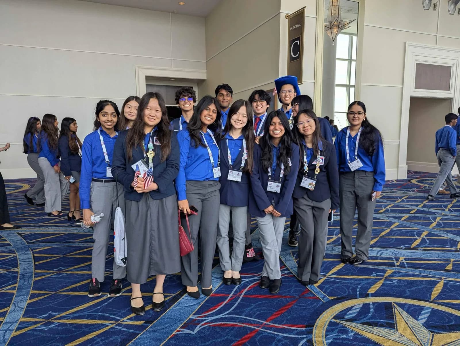 SLHS TSA national qualifiers in blue blazers at the national conference